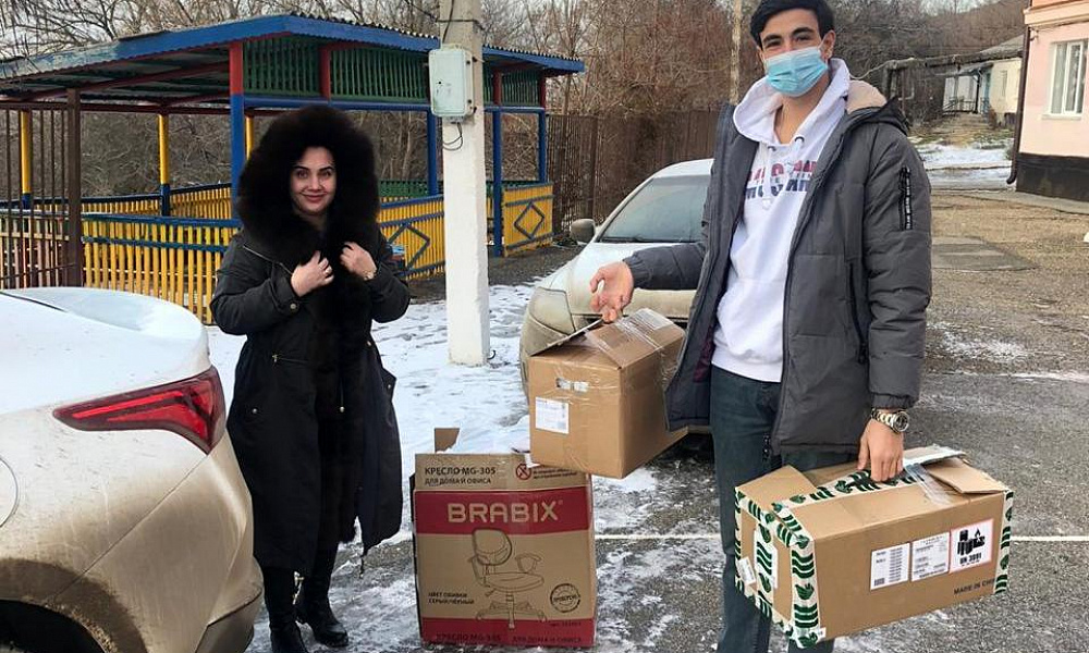 Отчёт о поездке с подарками в интернат с. Подлужное